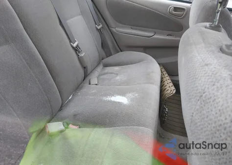 2002 Toyota Corolla Le из США, поврежденный, VIN 2T1BR12E22C575903